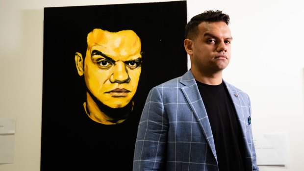 Meyne Wyatt with his self-portrait that won the Packer's Prize at this year's Archibald Prize. 