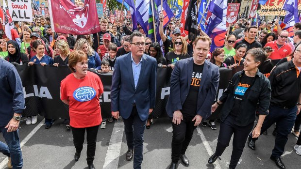 Premier Daniel Andrews leads a march in October with union leaders Lisa Fitzpatrick, Luke Hilakari and the ACTU's Sally McManus.