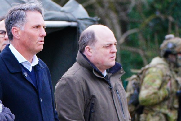 Defence Minister Richard Marles and UK Defence Secretary Ben Wallace watching training of Ukrainian military recruits in southern England this week.