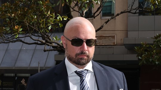 Brendan Gunn arriving at Downing Centre courthouse.