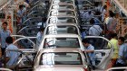 Chinese workers on the assembly line of a Ford Motor plant in Chongqing, Sichuan. Ford is one of three car makers most likely to use Baidu technology.