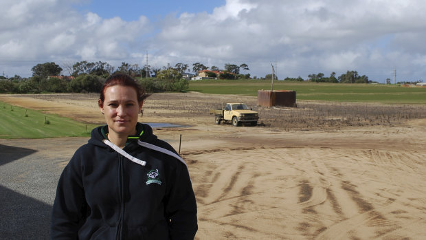 Kelly Vidovich outside the family's business, Betta Turf.