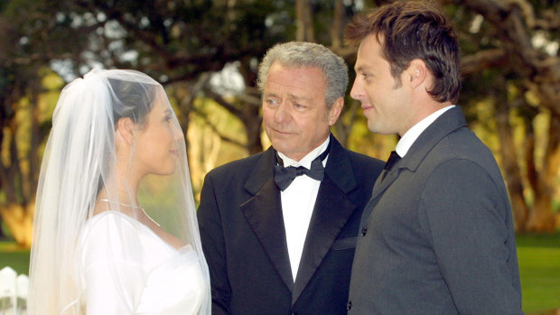 Sally Fletcher (Kate Ritchie) and Flynn ( Joel McIlroy) tie the knot as Donald Fisher (Norman Coburn) looks on in Home and Away.
