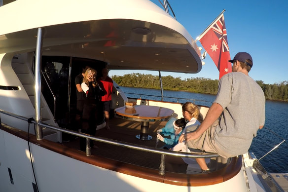 The Lady Pamela is moored at the Gold Coast City Marina while a nurse tests Hannah Fox for COVID-19 on the yacht. 