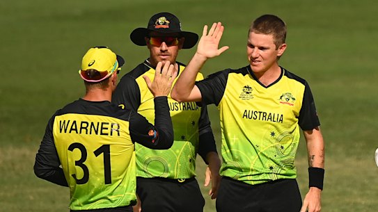 Adam Zampa (centre) celebrates taking another wicket in Australia’s defeat of Bangladesh.