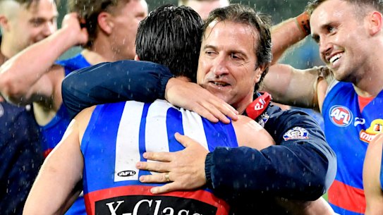 Luke Beveridge will coach the Western Bulldogs for a further three seasons.