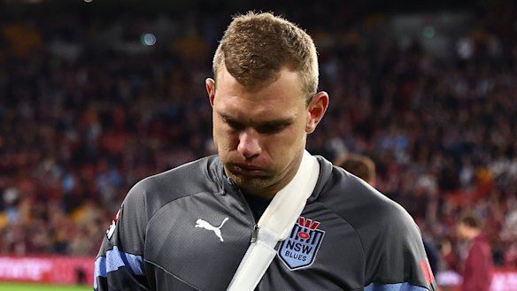 Blues centre Tom Trbojevic in a sling after the game.