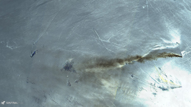 Satellite image shows the Norwegian-owned MT Front Altair ablaze with smoke rising from it in the Gulf of Oman.