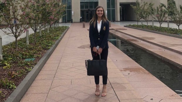 Brittany Higgins outside Parliament House on the first day of her job.