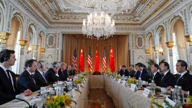 President Donald Trump, left, and Chinese President Xi Jinping participate in a bilateral meeting at Mar-a-Lago in 2017. 