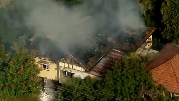 One of the houses at Hamilton ablaze in May.