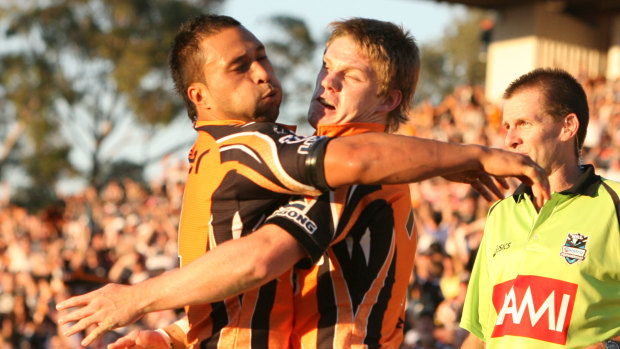 Familiar figure: Lawrence scores for the Tigers at CUA Stadium in Penrith back in 2007.