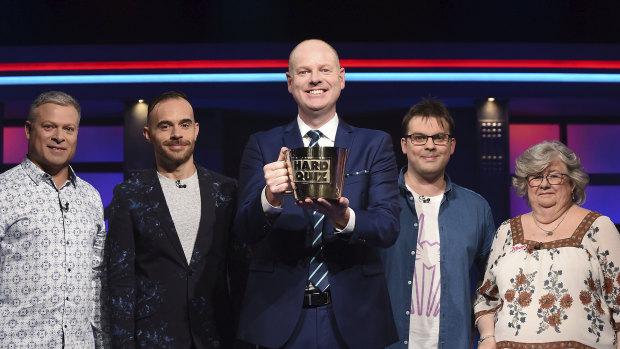 Most quiz shows invite viewers to scream answers from their couches; Tom Gleeson (centre) on the set of the irreverent Hard Quiz.