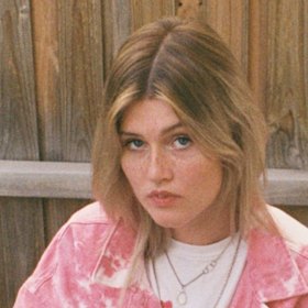 Singer Abby Kenneally tested positive in late March.