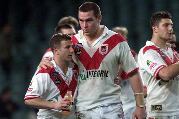 Dragons halfback Willie Peters and prop Jason Ryles in 2001.