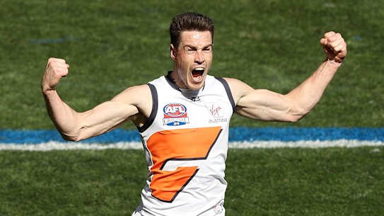 Jeremy Cameron celebrates after scoring a goal during the grand final last year. 