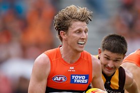 On the run: Giants playmaker Lachie Whitfield is a star.