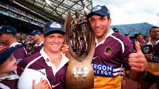 Walters, pictured with Gorden Tallis in 2000, had an extraordinary playing career, winning six premierships in all.
