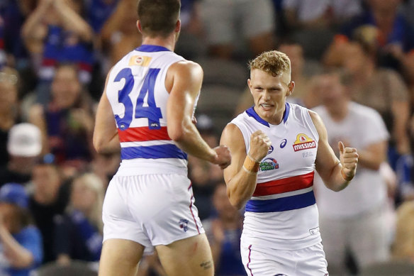 Bulldogs midfielder Adam Treloar celebrates his second goal. 