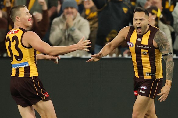Jarman Impey (right) celebrates a telling goal.