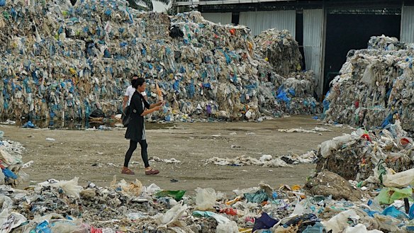 Piles of imported plastic wastes at a closed-down illegal plastic recycling factory in Jenjarom. Malaysia. 
