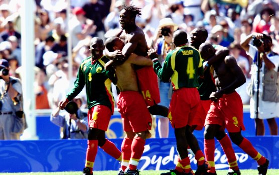 Cameroon celebrate their win over Spain in 2000.