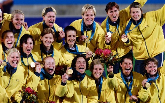 The Hockeyroos with their gold medals.