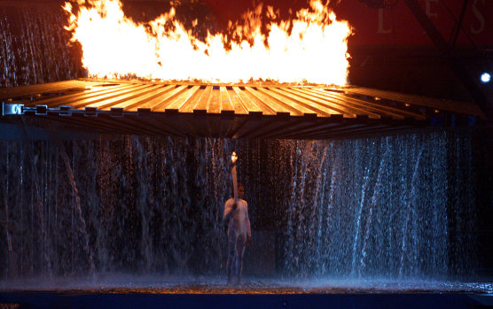 Cathy Freeman lights the flame in the opening ceremony.