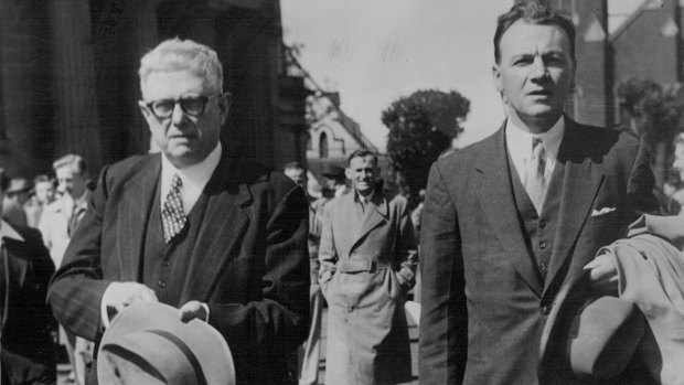 Dr Bert Evatt, left, leaves the court after his brief to appear at the Petrov Commission was withdrawn. September 08, 1954.