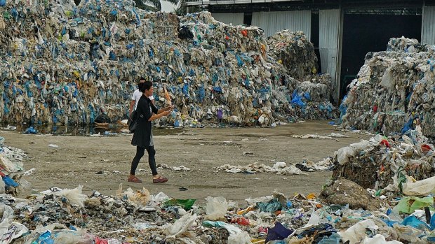 Piles of imported plastic wastes at a closed-down illegal plastic recycling factory in Jenjarom. Malaysia. 