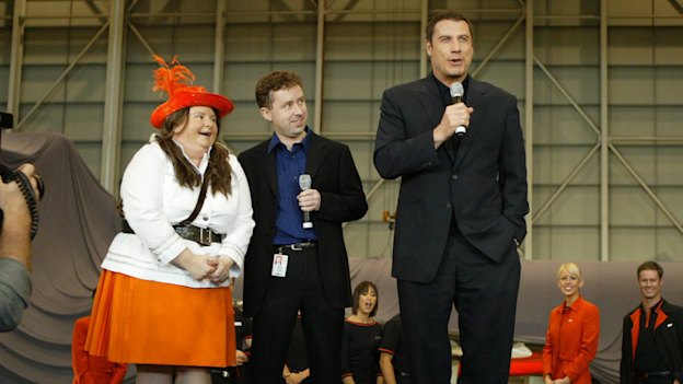 Entertainer Magda Szubanski, then Jetstar CEO Alan Joyce and actor John Travolta at the airline's launch.