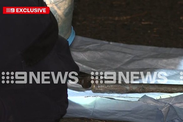 A loaded shotgun was allegedly located under the driver’s seat.