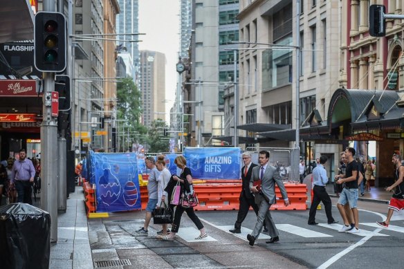 Roads were blocked off and noise and barriers greeted pedestrians during the construction of the light rail.