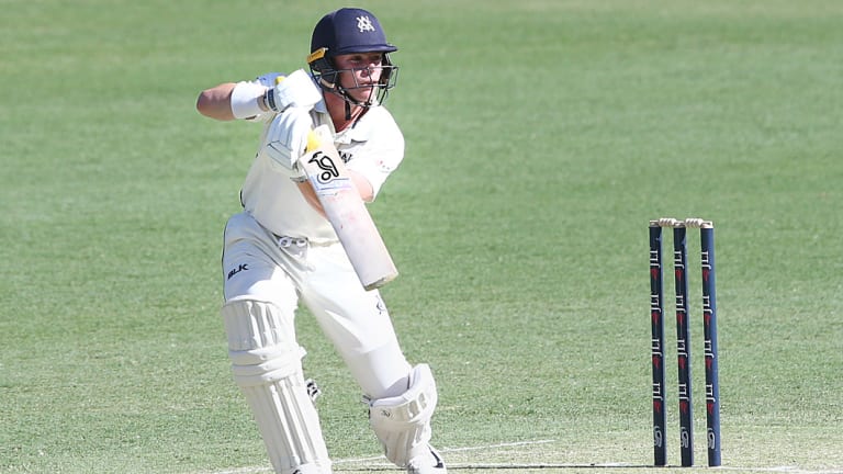 Marcus Harris of Victoria plays a shot at Queensland in the Sheffield Shield.