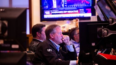 All eyes are on inflation: Traders on the floor of the New York Stock Exchange.
