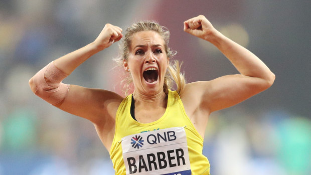 Kelsey-Lee Barber celebrates her gold medal triumph at the world championships in Doha.