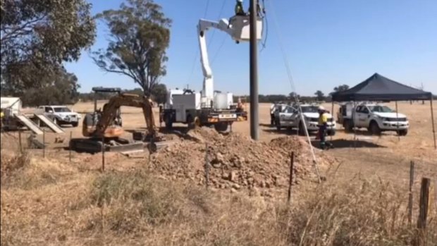 Crews working near Nagambie to restore power to the township. 