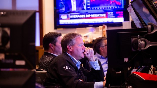 All eyes are on inflation: Traders on the floor of the New York Stock Exchange.