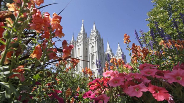 Flowers bloom in front of the Salt Lake Temple in Salt Lake City.
