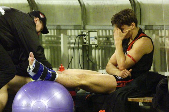 Matthew Lloyd on the bench at quarter time and out of the match with an injured ankle.