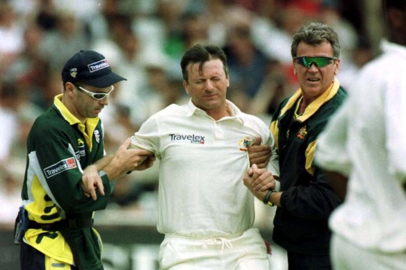 Steve Waugh being helped from the ground at Trent Bridge in 2001.