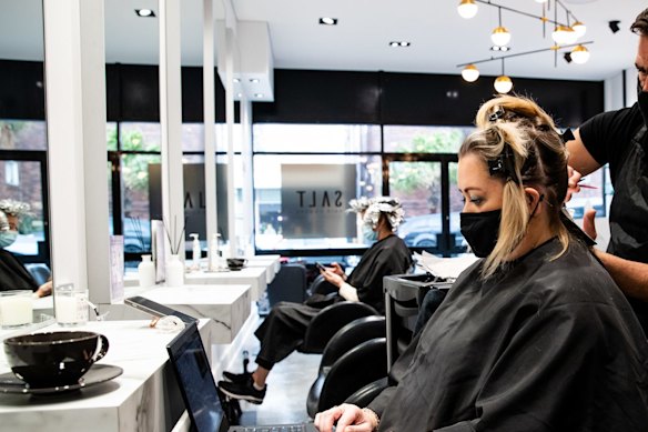 Hairdresser Tony Boutsalis from Salt Hair in Coogee with customer Helen Appleton. 