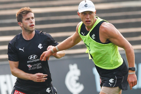 Marc Murphy and Patrick Cripps train for Carlton on Monday. 