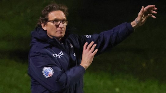 On the tools: Essendon great James Hird in action at Port Melbourne Football Club this week.