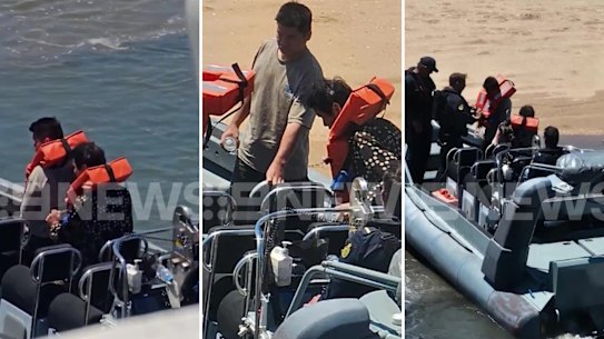 Two of six Chinese nationals who were found wandering in Kalumburu, in WA’s remote north, being escorted by Border Force officers earlier this week.