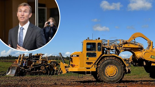 Giant scrapers undertake major earthworks on the airport site at Badgerys Creek. - Kate Geraghty composite with Rob Stokes - Simon Bennett