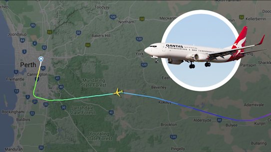 Main: Qantas Flight 933 made the emergency call several hundred kilometres east of Perth on Monday. Inset: Qantas Boeing 737-838