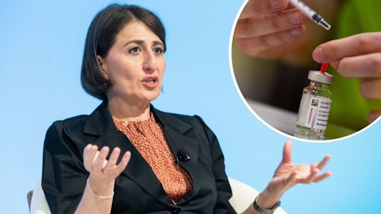 Composite: Gladys Berejiklian, Premier of NSW Financial Review Business Summit 2021 Tuesday 9th March 2021 AFR photo LOUIE DOUVIS .A pharmacist prepares to fill a syringe with the AstraZeneca COVID-19 vaccine at the Vaccine Village in Antwerp, Belgium on Tuesday, March 16, 2021. Belgium on Tuesday reaffirmed its support to AstraZeneca vaccines and said it will keep using it in its current vaccination campaign, amid raising concerns over its side effects and with growing number of EU countries deciding to protectively stop using it. (AP Photo/Virginia Mayo)