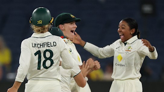Annabel Sutherland and Alana King embrace after their starring efforts deliver Australia an emphatic Ashes Test victory over England.