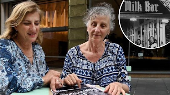 Debbie Ditchfield (left) and her sister Janet France (right) with historical photos of their grandfather Mick Adams who owned the Black and White 4d Milk Bar in Martin Place.